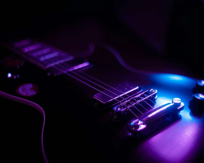 Photo de Xie lipton sur Unsplash Cordes de Guitare Tolito